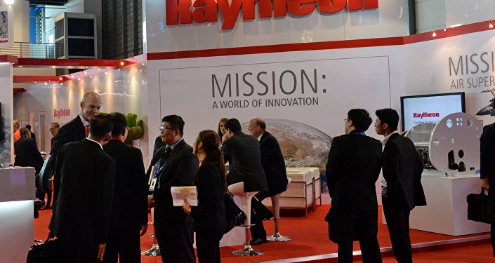 Raytheon booth at a defense trade show.